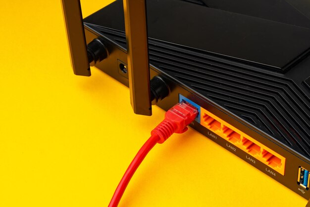 Colored network cable patchcord on yellow background