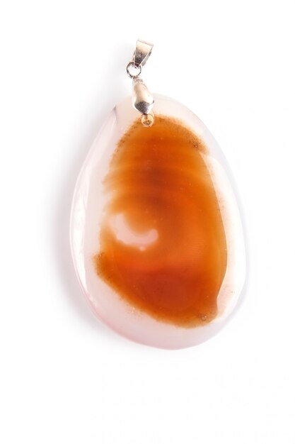 Colored onyx pendant isolated on white surface