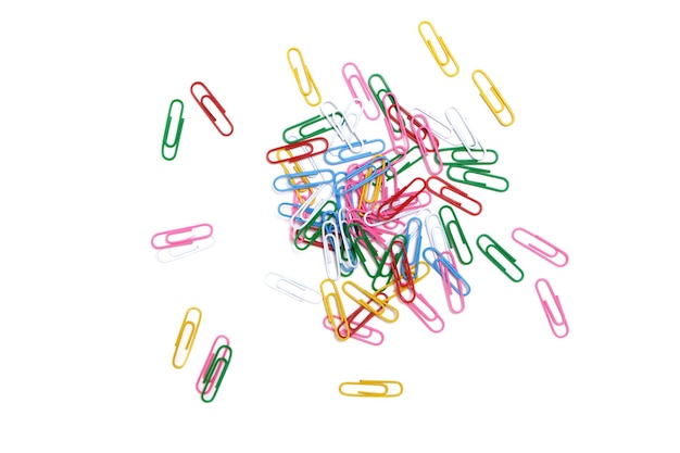 Colored paper clips on a white background