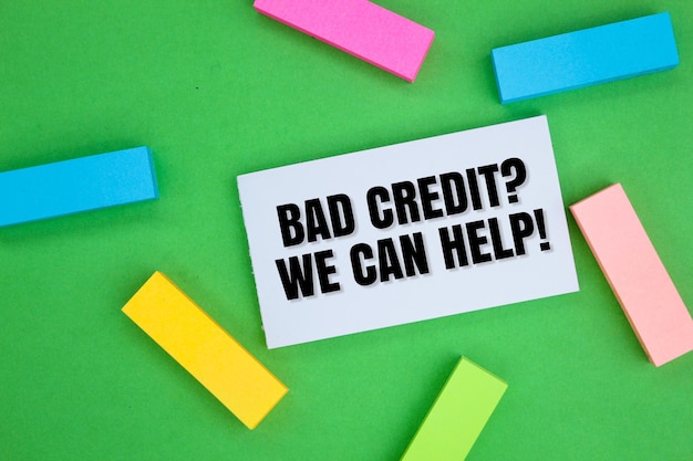 colored paper with the words Bad Credit We Can Help