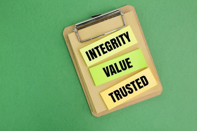 colored paper with the words integrity value trusted the concept of selfworth or selfeducation