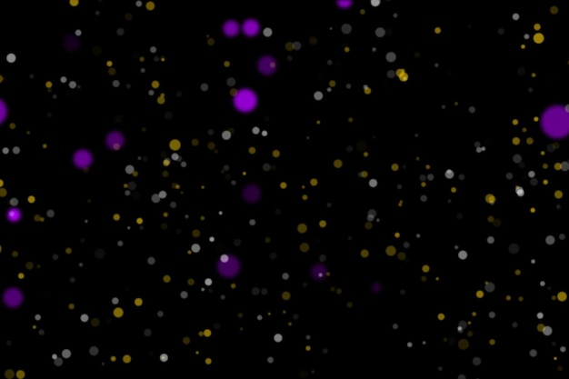 Colored particles on black background