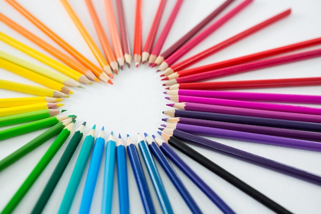 Photo colored pencils arranged in heart shape