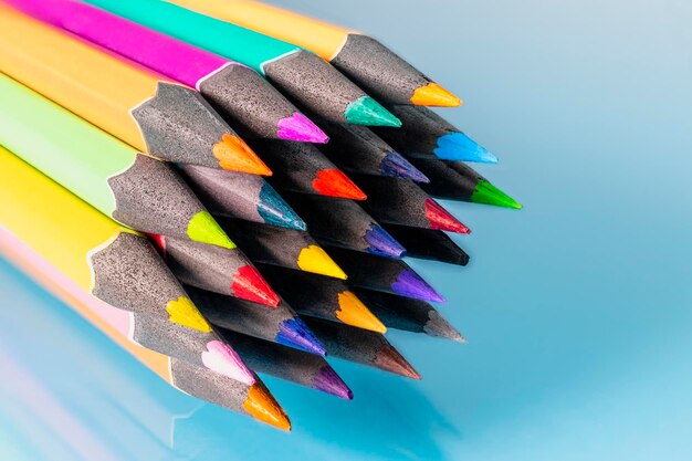 Colored pencils close up. Macro shooting. A tool for drawing and creativity for children and adults. Drawing with colored pencils.