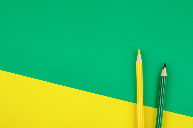 Colored pencils on colored background Minimalist creative concept