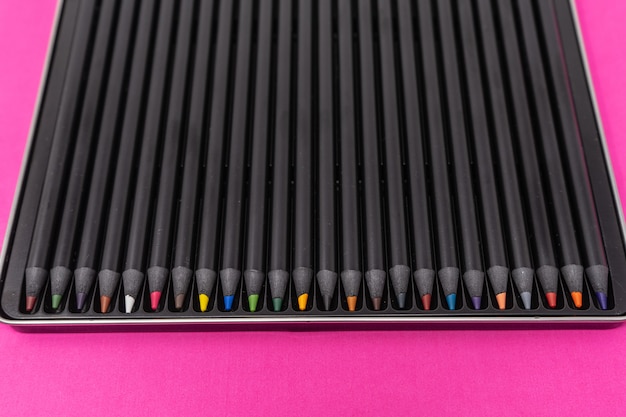 Colored Pencils Isolated On Pink Background 