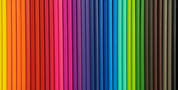 Colored pencils in a row