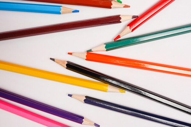 Colored pencils for school or professional use on white background