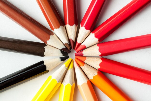 Colored pencils stacked in a circle