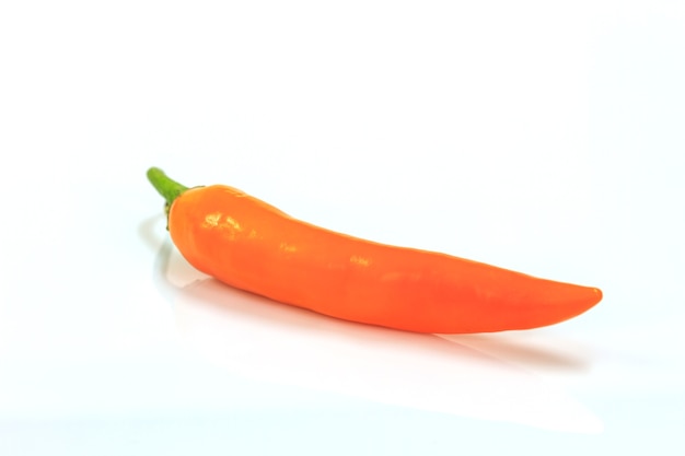 Colored peppers over white background