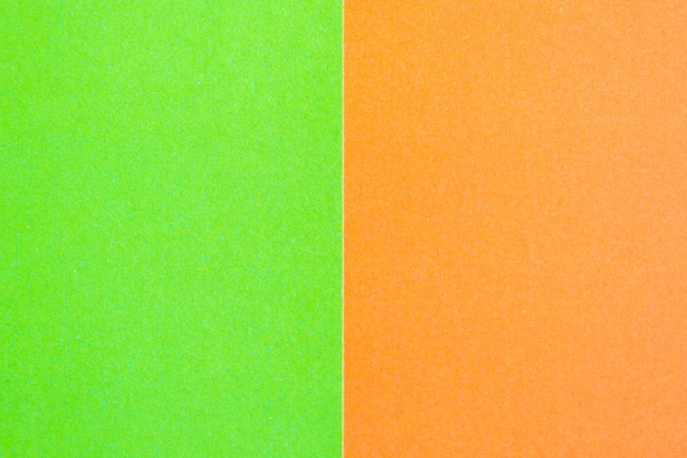 Colored pieces of paper orange and green symmetry