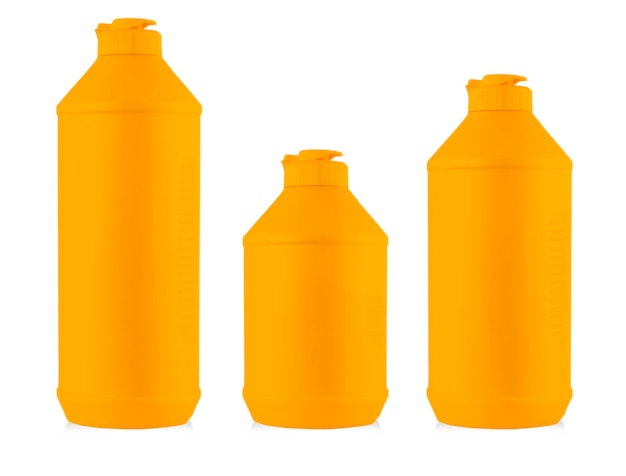 Colored plastic bottles with liquid laundry detergent, cleaning agent, bleach or fabric softener isolated on white background