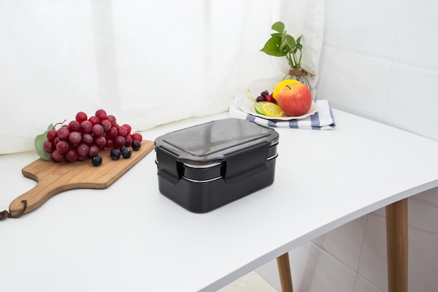 Colored plastic lunchboxes on the table