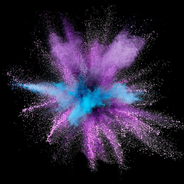 Colored powder explosion. Abstract closeup dust on backdrop. Colorful explode. Paint holi