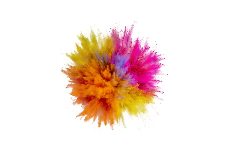 Photo colored powder explosion. abstract closeup dust on backdrop. colorful explode. paint holi