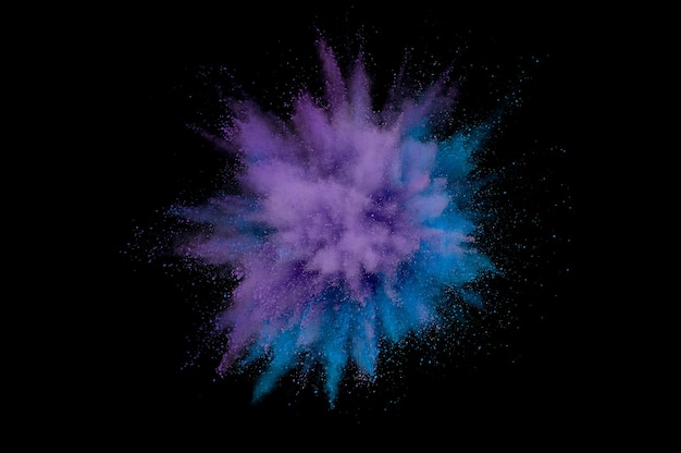 着色粉末爆発。背景に抽象的なクローズアップのほこり。カラフルな爆発。ホーリーを描く