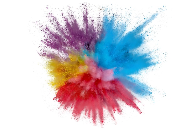 Photo colored powder explosion on a white background. abstract closeup dust on backdrop. colorful explode. paint holi