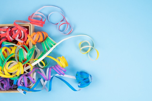 Colored ribbons on blue background. Colorful spirals LGBTQIA culture.