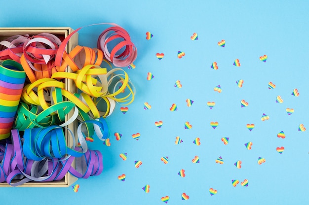 Colored ribbons on blue background. Colorful spirals LGBTQIA culture.