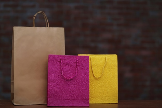 Colored Shopping Bags on dark surface