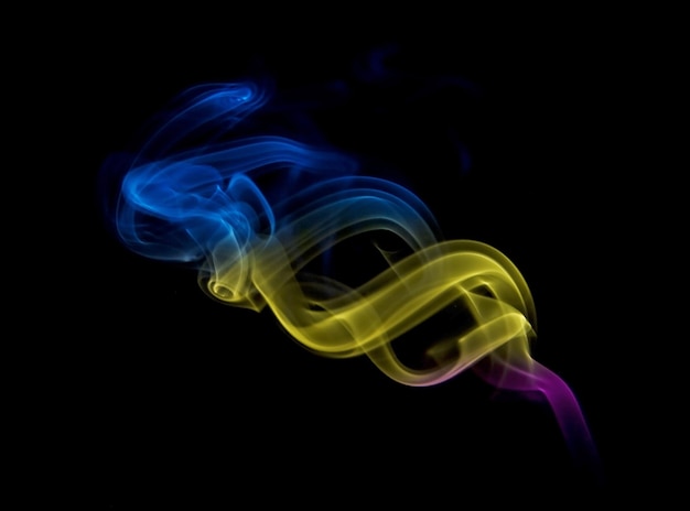 Colored smoke on black background