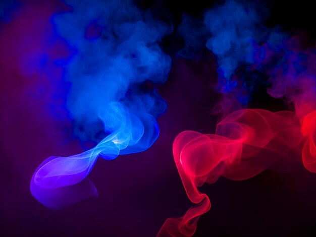 Colored smoke on a dark background Blue and red light with smoke