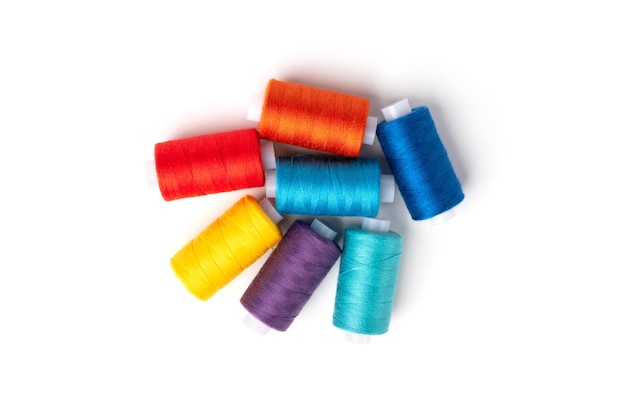 Colored threads on white background.