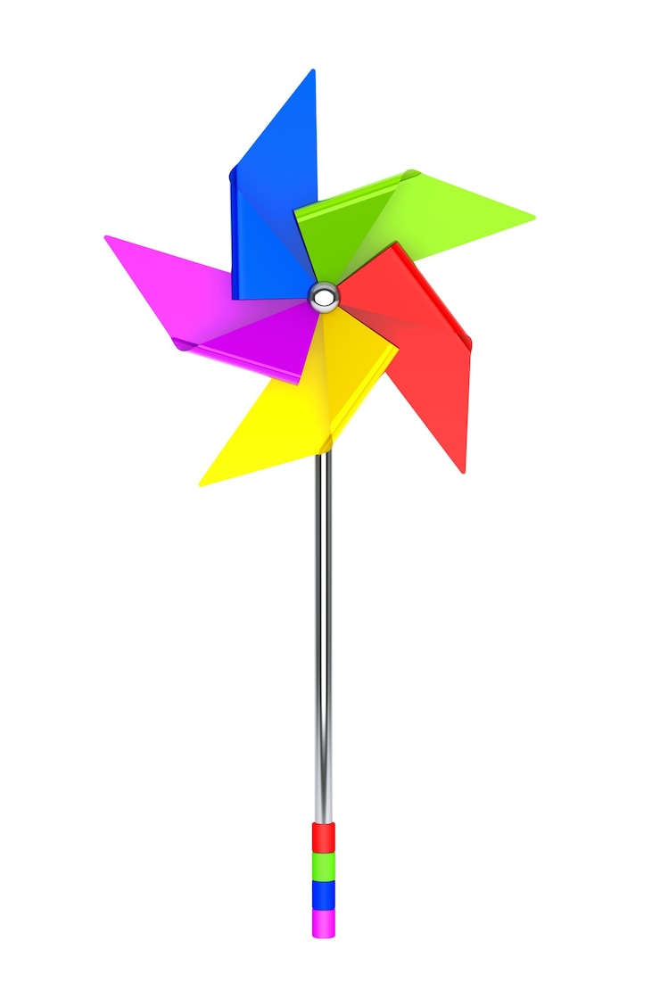 Photo colored toy pinwheel windmill on a white background