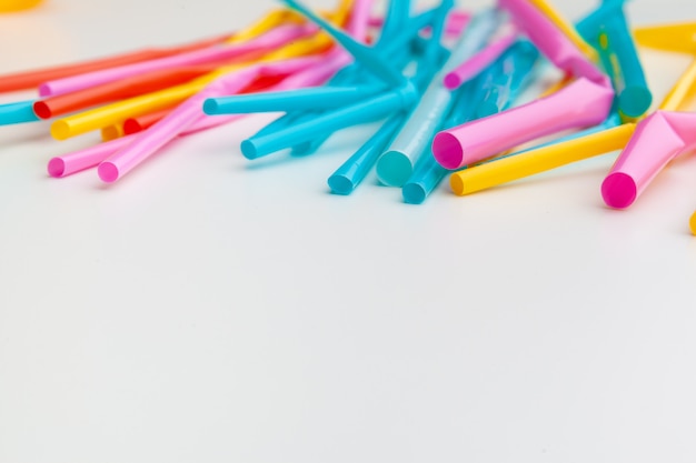 Colored tubules for juice and cocktails close up