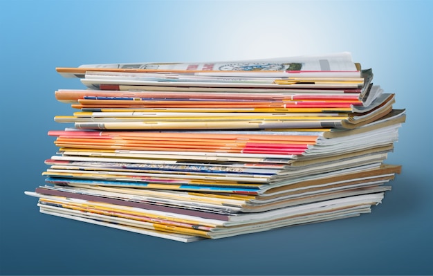 Colorful abstract background image of stacked magazines.