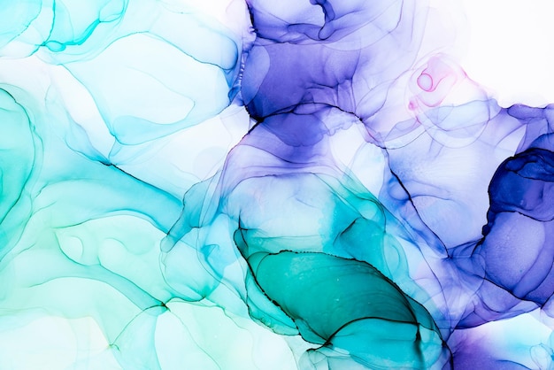 A colorful abstract background with a white background and a blue and purple ink.