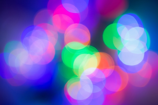 Photo colorful abstract blurred circular bokeh light of night city street for background. graphic design and website template design.