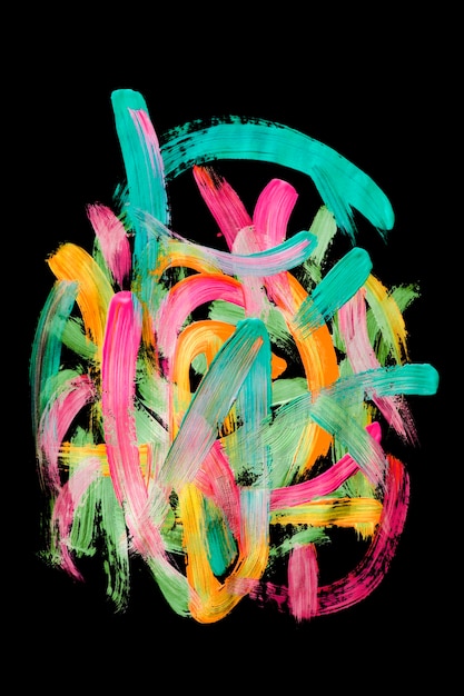 Photo colorful abstract neon brush strokes on black background