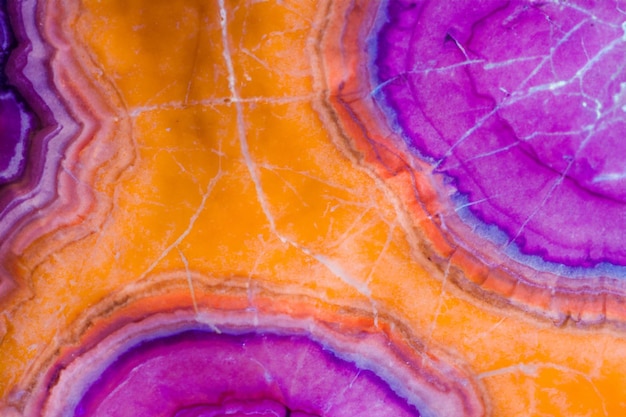 A colorful, abstract pattern of a purple, orange, and purple, is shown in this image