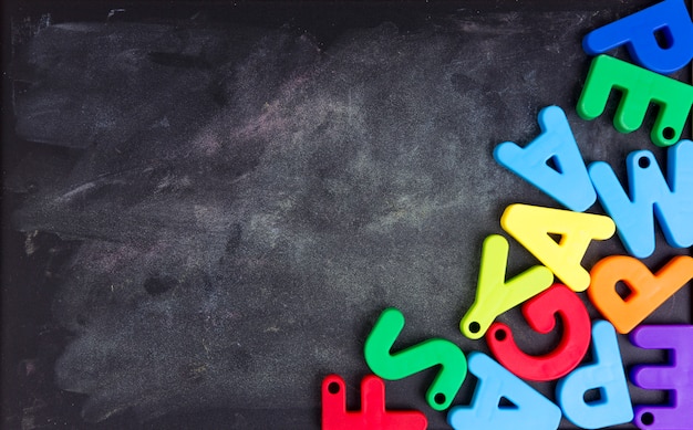 Colorful Alphabet On A Blackboard Or Chalkboard