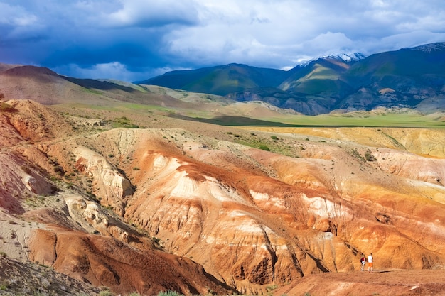 Colorful Altai Mountains landscape with clouds over the tops in the snow