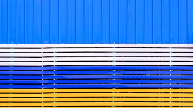 Colorful aluminium trellis sunshade fence decoration with blue corrugated steel wall background