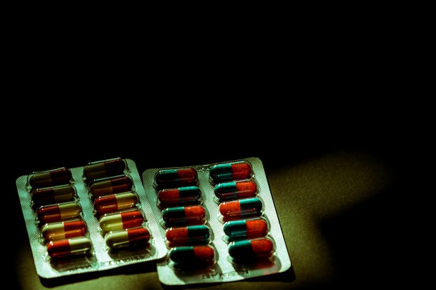 colorful of antibiotic capsule pills in blister pack 