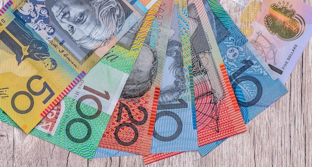 カラフルなオースリー・オード オーストラリアの貨幣の背景 貨幣と金融