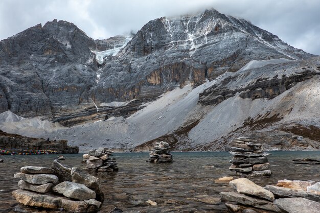 Colorful in autumn forest and snow mountain at Yading nature reserve