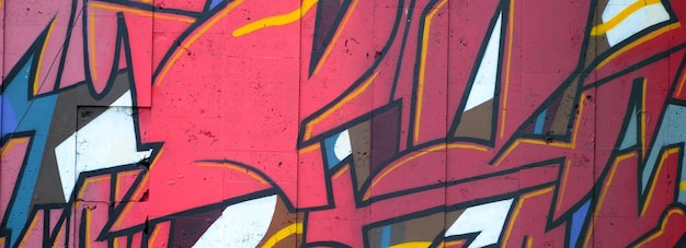 Colorful background of graffiti painting artwork with bright aerosol outlines on wall old school