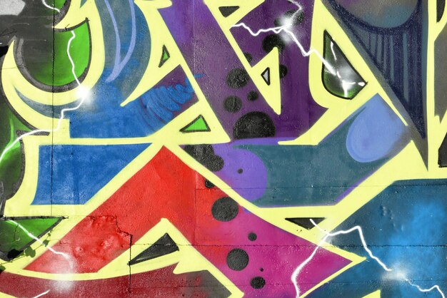 Colorful background of graffiti painting artwork with bright aerosol strips on metal wall