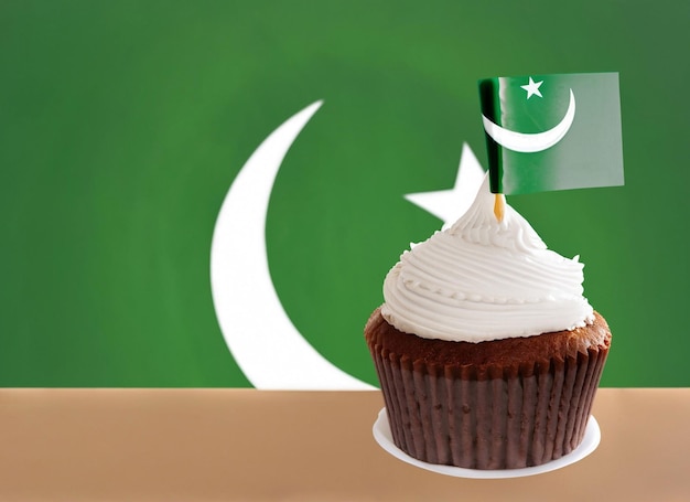 On a colorful background a hand with ice cream in the form of the flag of Pakistan