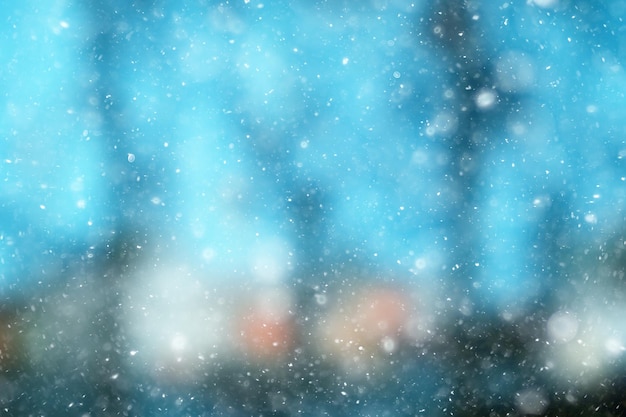 colorful background snow snowfall evening christmas lights, soft light blurry