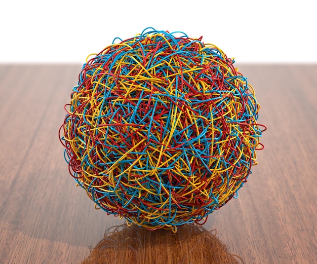 Photo colorful ball of wire on table