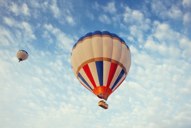 Colorful balloon on the blue sky.