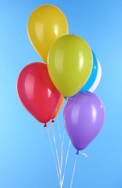 Colorful balloons on blue background