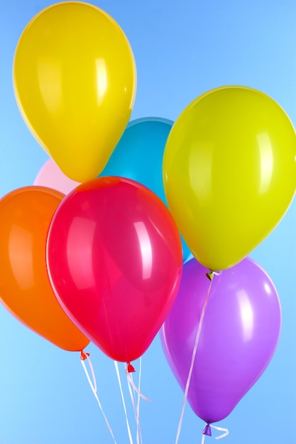 Colorful balloons on blue background