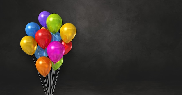 Photo colorful balloons bunch on a black wall background. horizontal banner. 3d illustration render