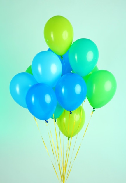 Colorful balloons on color background